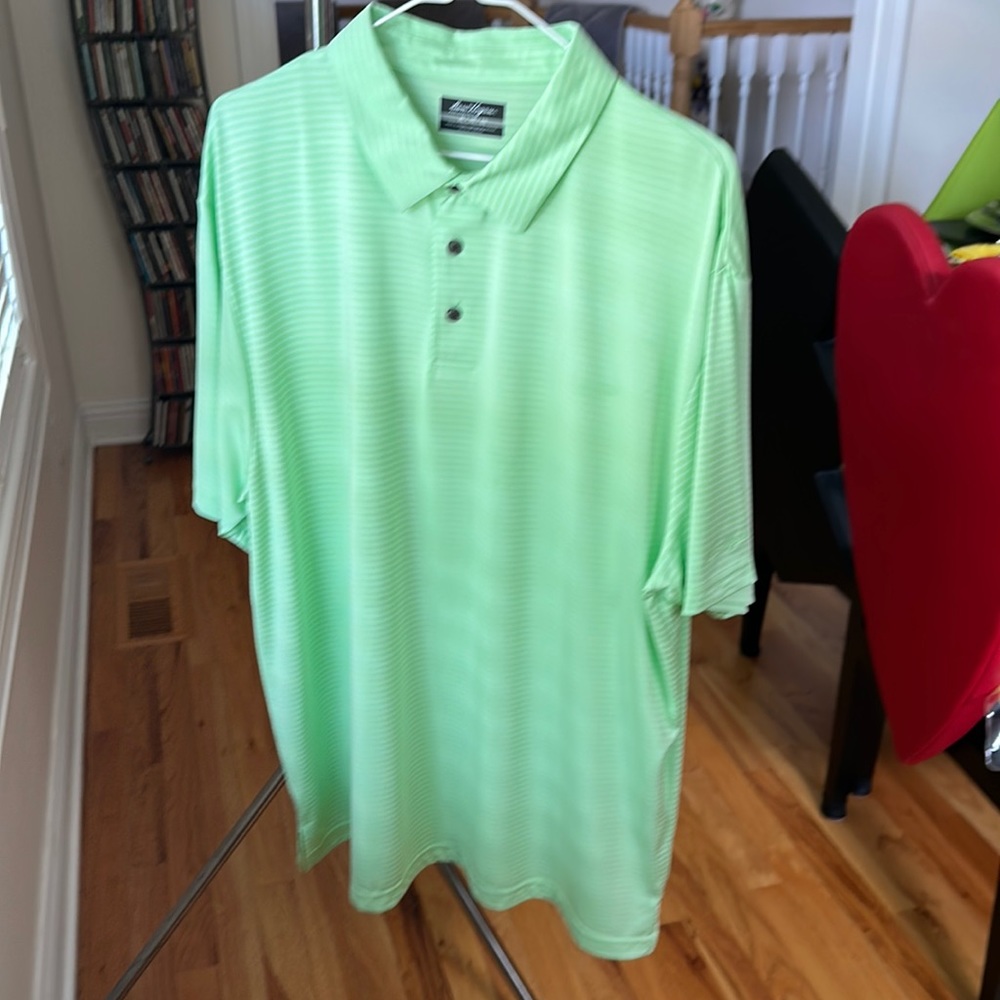 Men’s XL Ben Hogan golf shirt. Light green. Like new condition -never worn.